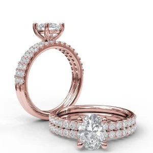 Hot Fana Classic Single Row Engagement ring with an Oval Center Diamond.