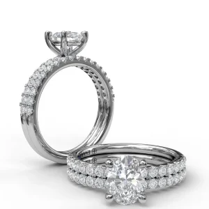 Hot Fana Classic Single Row Engagement ring with an Oval Center Diamond.